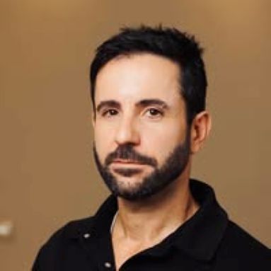 פרופיל - גיא אתגר